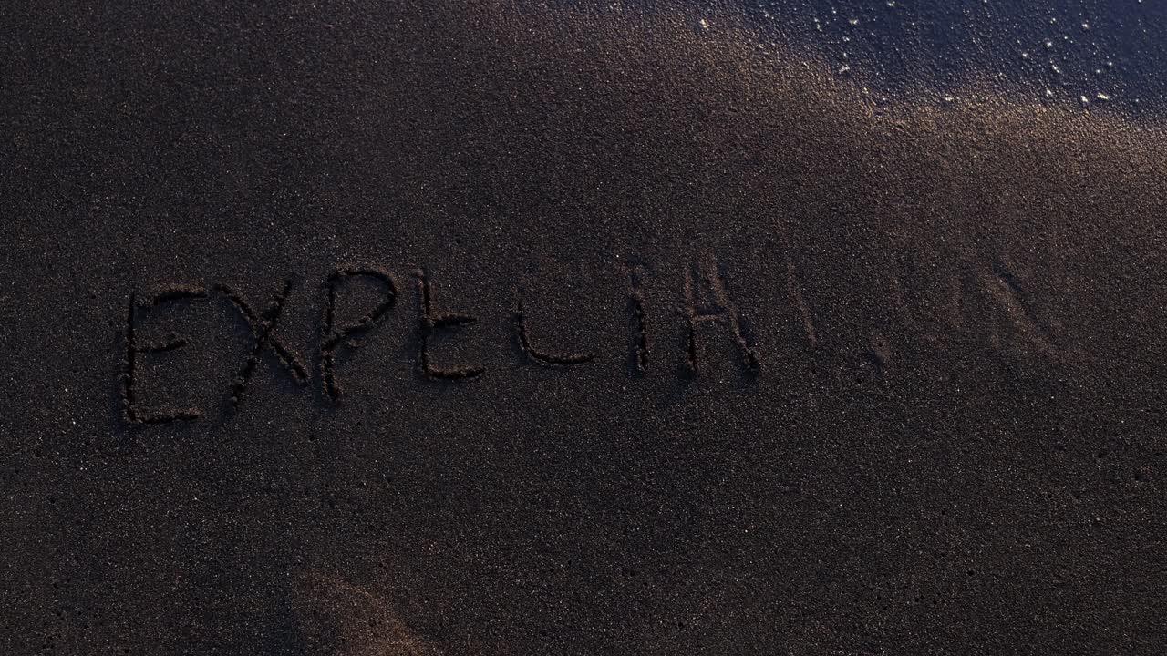 The word 'EXPECT' written in sand being washed away by ocean waves