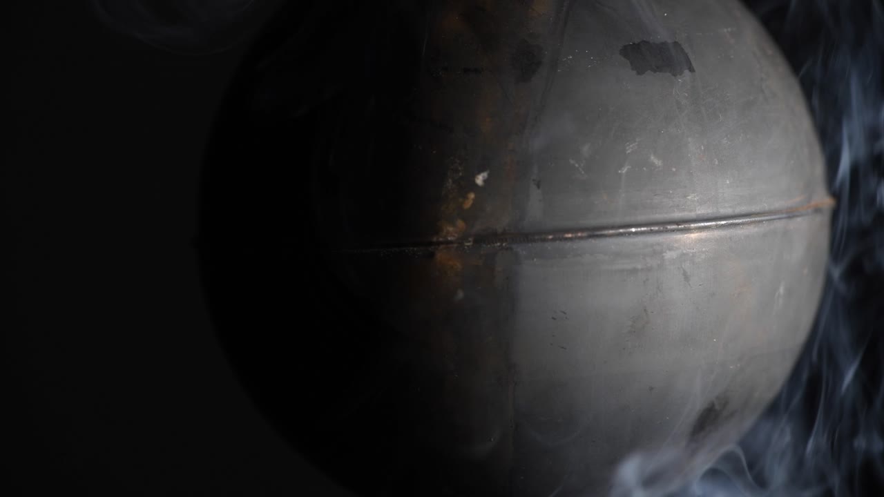 As the Dark World Turns, smoke surrounds    -  For more, search  "AbstractVideoClip" using the quotation marks.