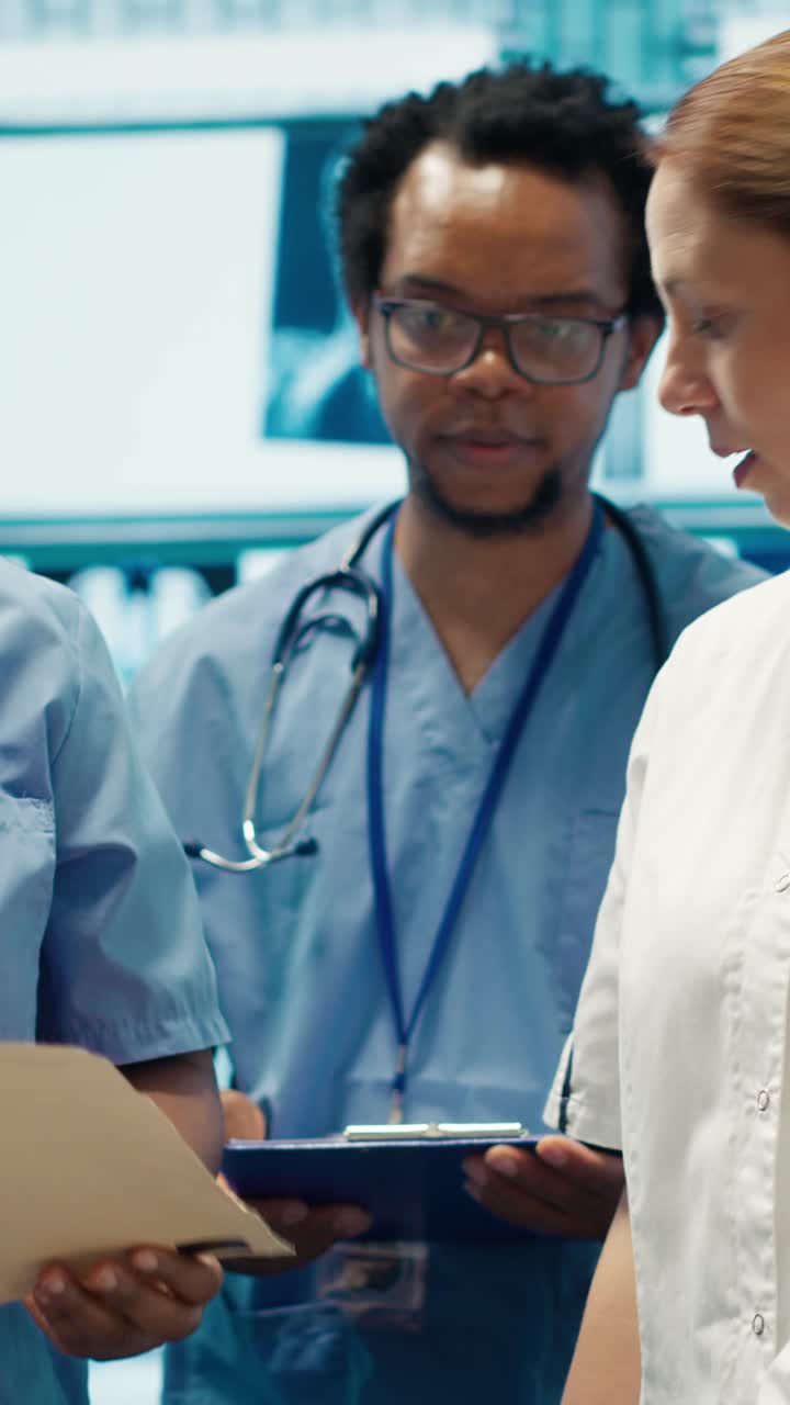 Vertical Video Doctors team review human anatomy scans to develop treatment plans