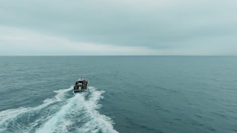 Aerial-shots-of-a-ship-in-Sete,-it-is-a-scientific-ship-that-takes-samples-to-control-bacteria-and-global-warming