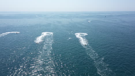 aerial view of jet skis racing on the mediterranean sea sunny day summer water