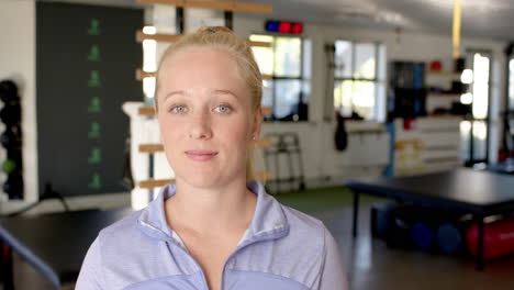 smiling woman in rehabilitation center, focusing on disability recovery and wellness