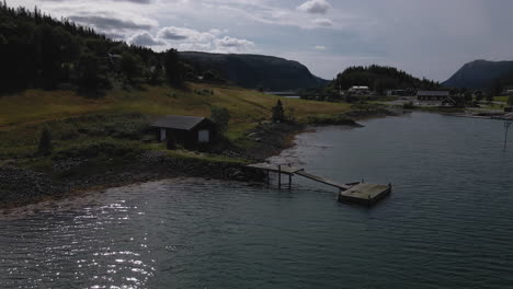 aerial view of a boat house and jetty on the lakeshore