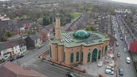 Aerial-view-of-Gilani-Noor-Mosque-in-Longton,-Stoke-on-Trent,-Staffordshire,-the-new-Mosque-being-built-for-the-growing-muslim-community-to-worship-and-congregate