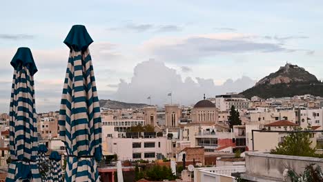 View-of-Lycabettus-Hill-from-a-rooftop-bar,-Athens,-Greece,-Europe