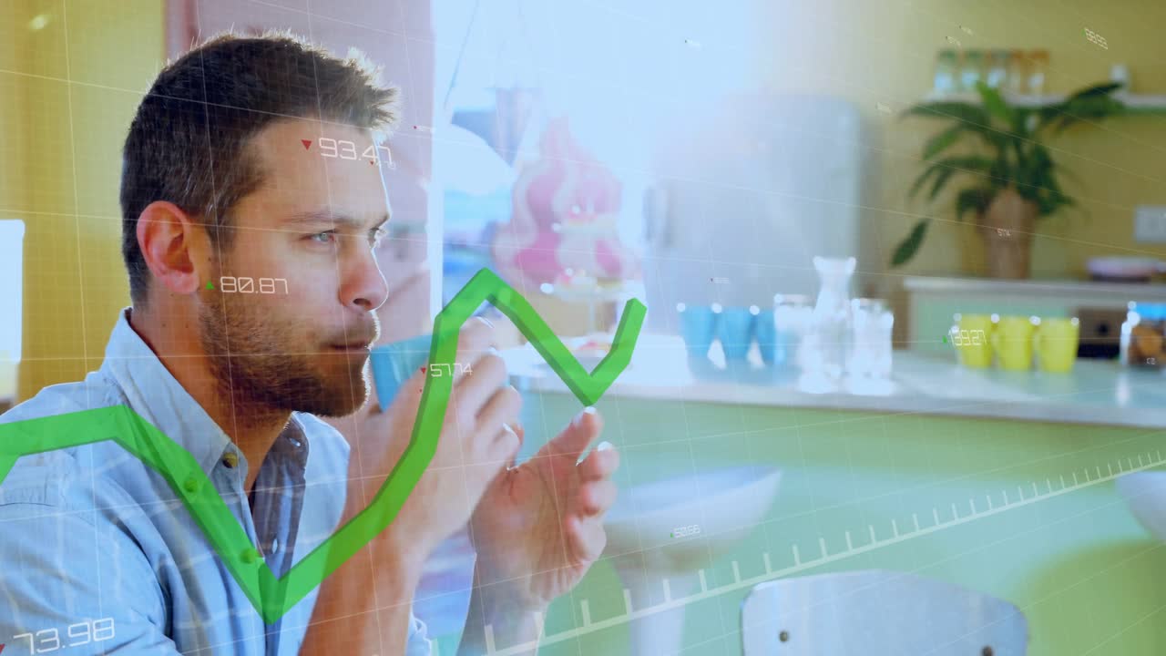 Man cupping blue mug then sipping while following rising green graph data for finance monitoring