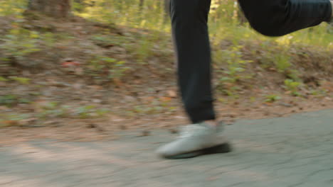 person running in a forest path