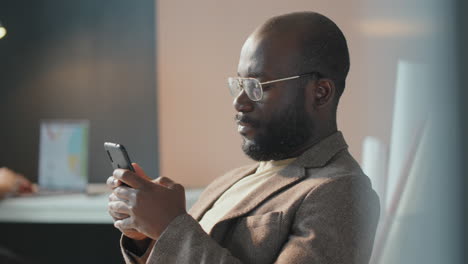 man surfing internet on smartphone