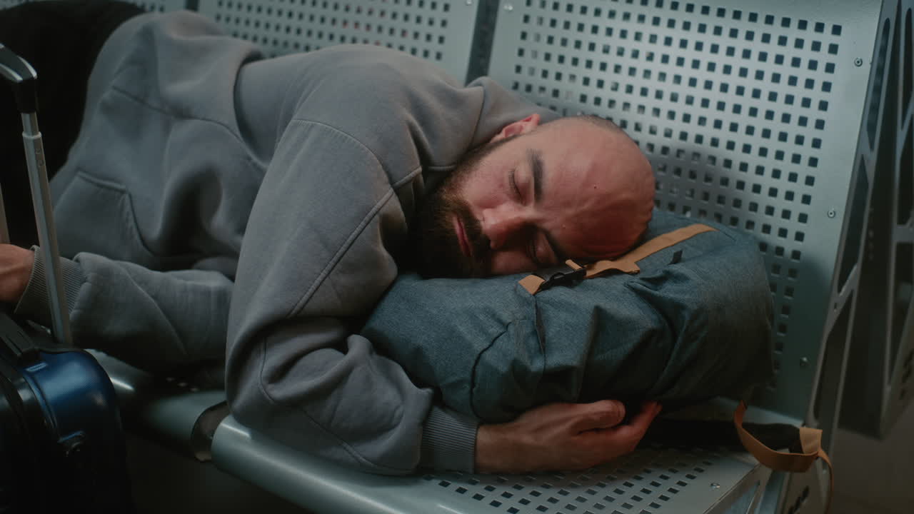Sleeping Passenger at the Airport
