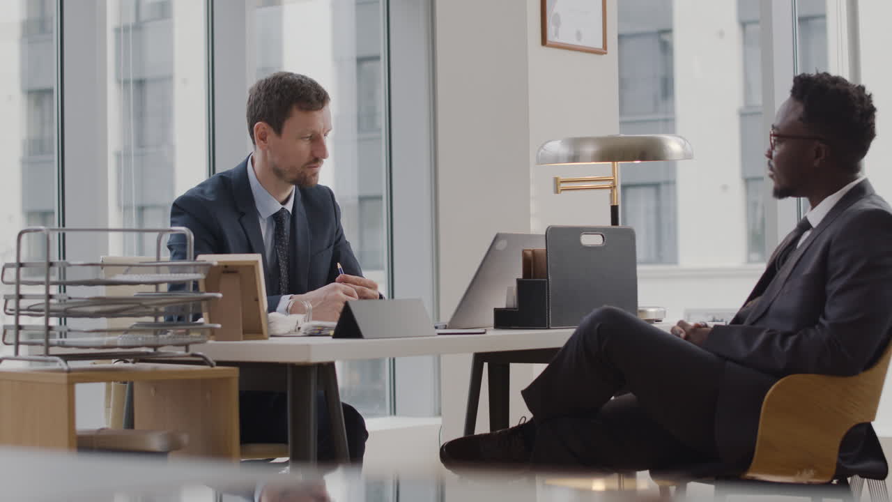 African american man doing a consult to his lawyer