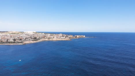 Aerial-drone-video-from-Malta,-Marsaskala-area-from-Munxar-Path-at-winter