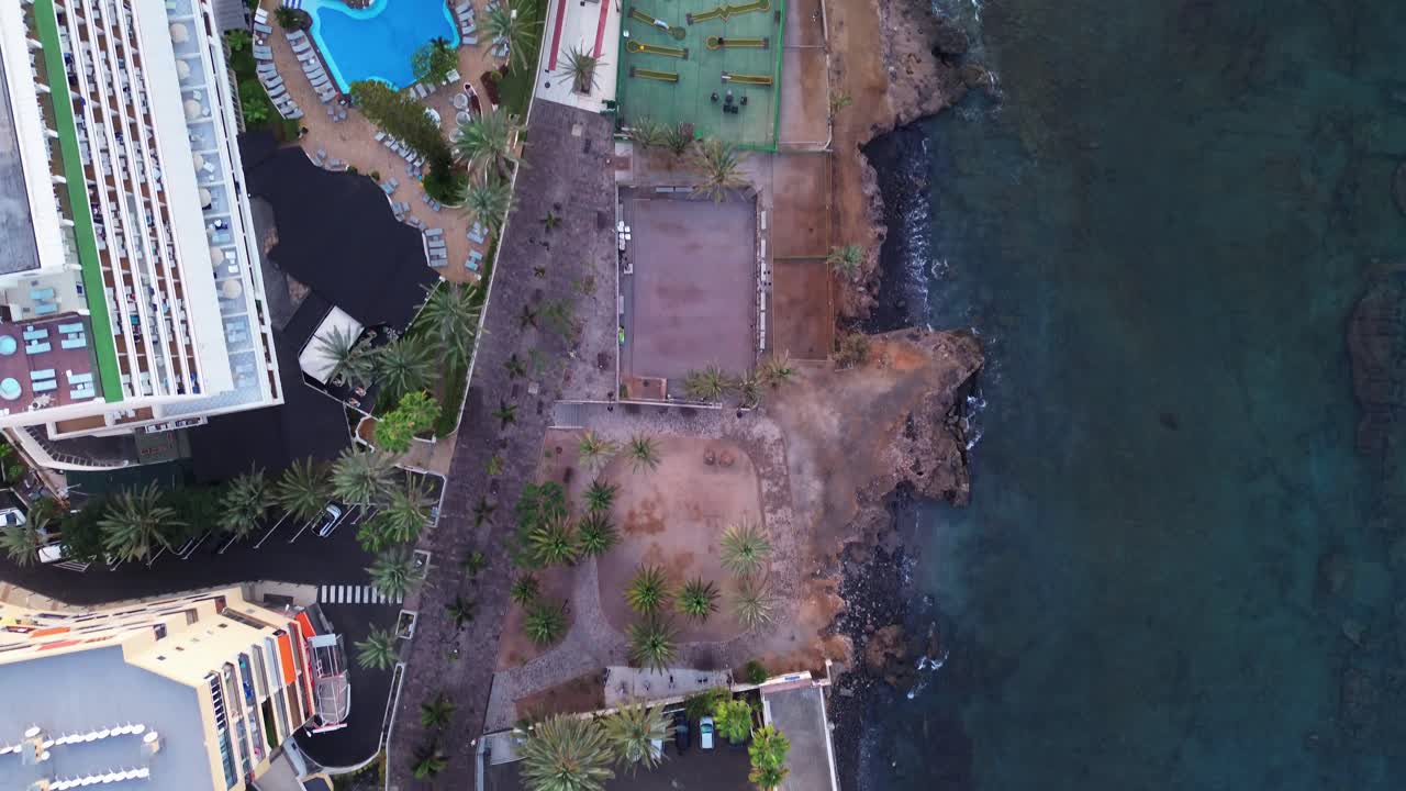 Los Cristianos Tenerife coastline early morning calm holiday resort city Spain