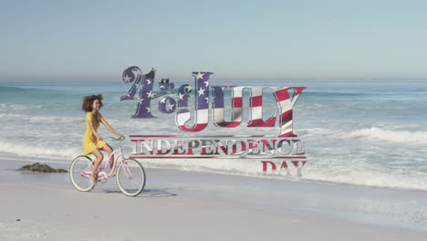 animation of 4th of july independence day text with american flag pattern and woman on bike on beach