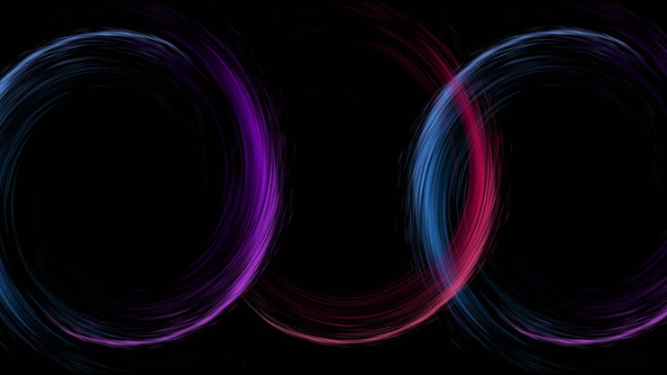 Animation of colourful light trails forming circles on black background