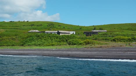 abandoned houses on a volcanic island beach