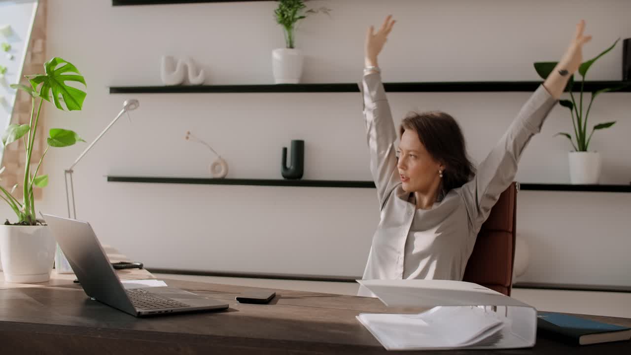 Woman Relaxing in Office