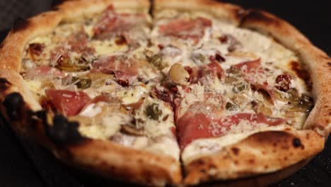 delicious prosciutto and mushroom pizza