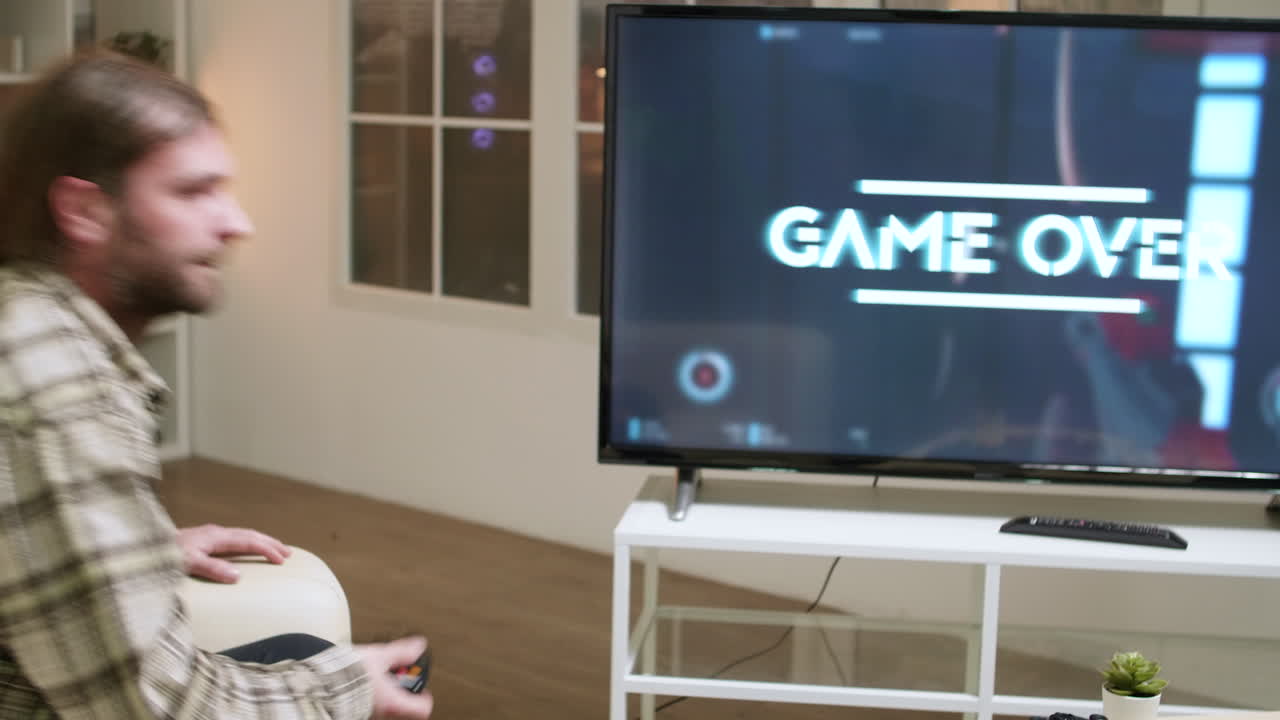 Man playing video games with VR headset