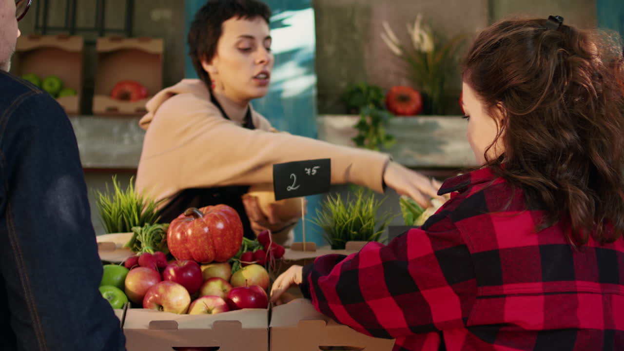 People Shopping for Produce at a Farmers Market