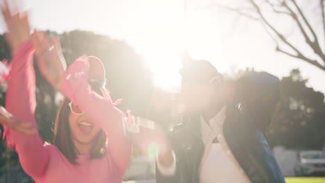 friends celebrating outdoors