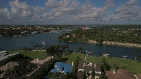 Drone-Over-Jupiter-Inlet-Colony-in-Jupiter-Florida-Toward-Lighthouse