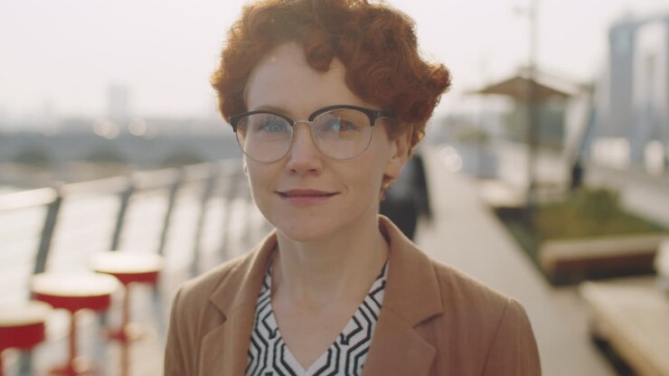 Portrait of Redhead Businesswoman on Street