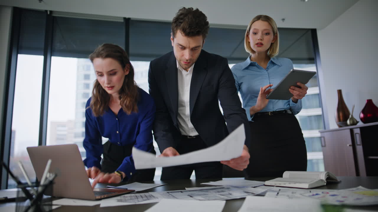 Business team discussing project plans in office