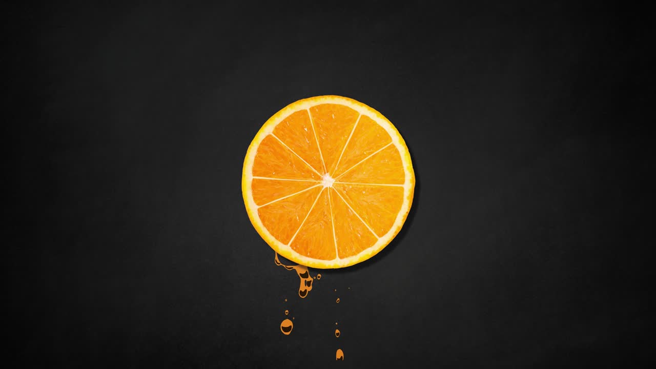 dos rebanadas de naranja girando