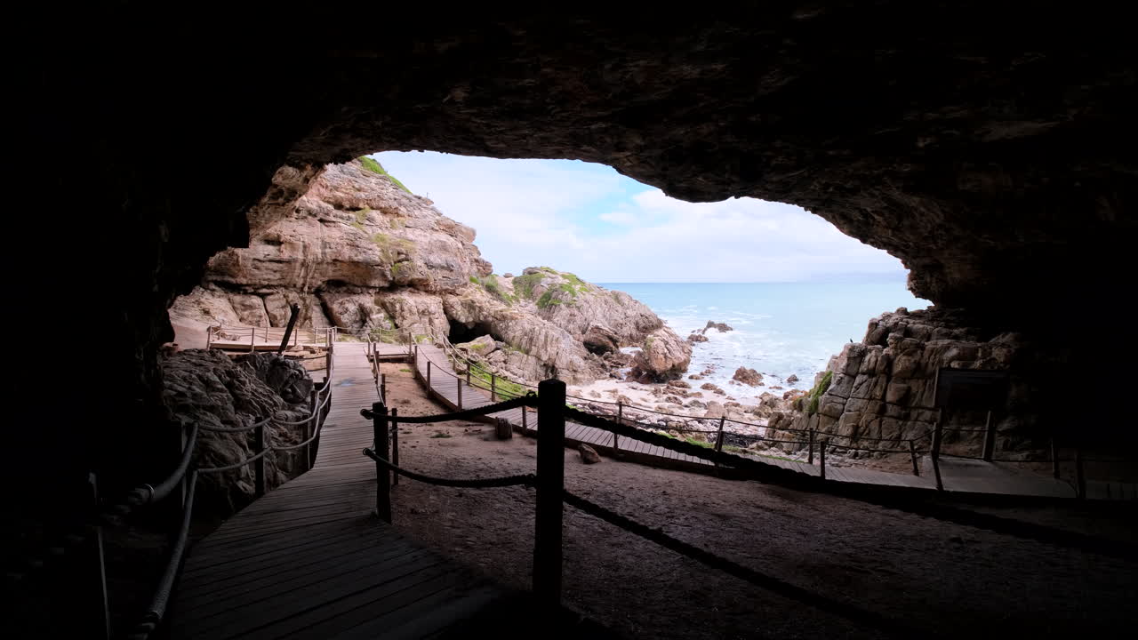 Outward view over wooden boardwalk in Klipgat Cave on De Kelders coastline