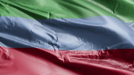 la bandera de dagestán se agita lentamente en el bucle del viento. la bandera de dagestán se balancea suavemente en la brisa. fondo de relleno completo. bucle de 20 segundos.