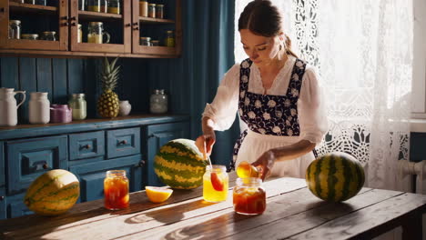 woman preparing watermelon in a rustic kitchen