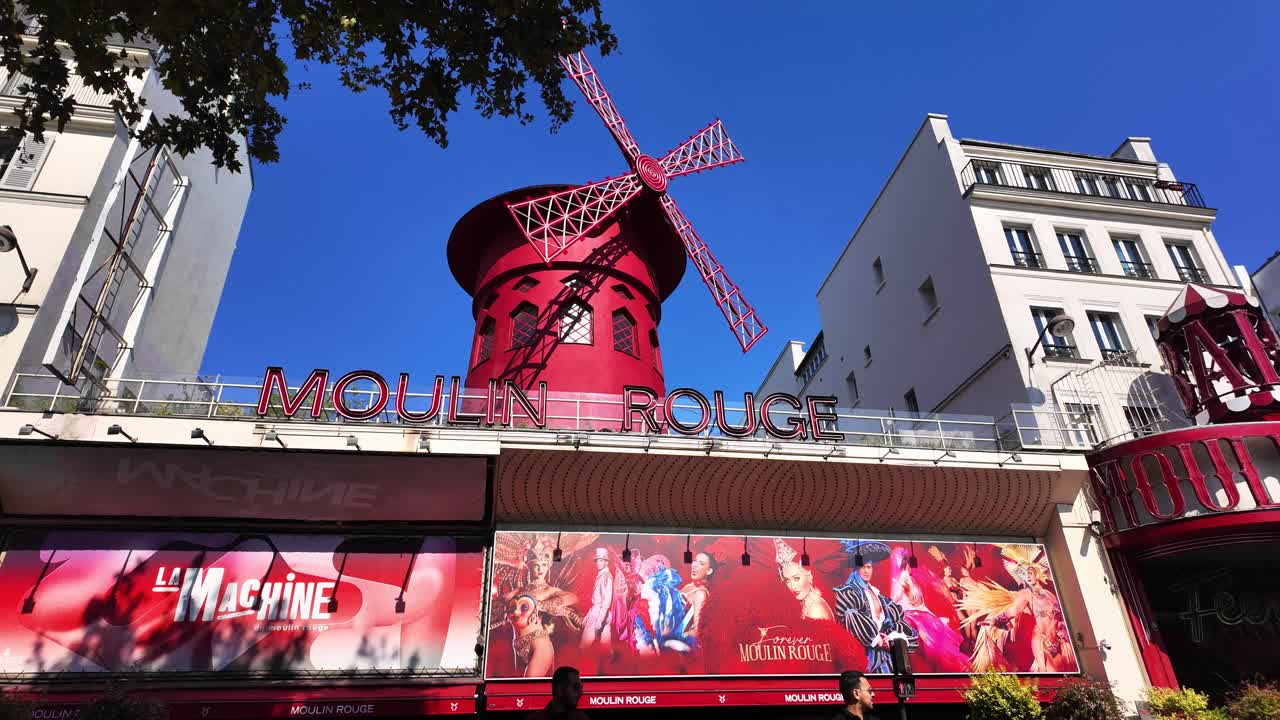 Moulin Rouge famous cabaret building Paris France red light district day time