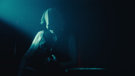 mysterious figure in dog mask
