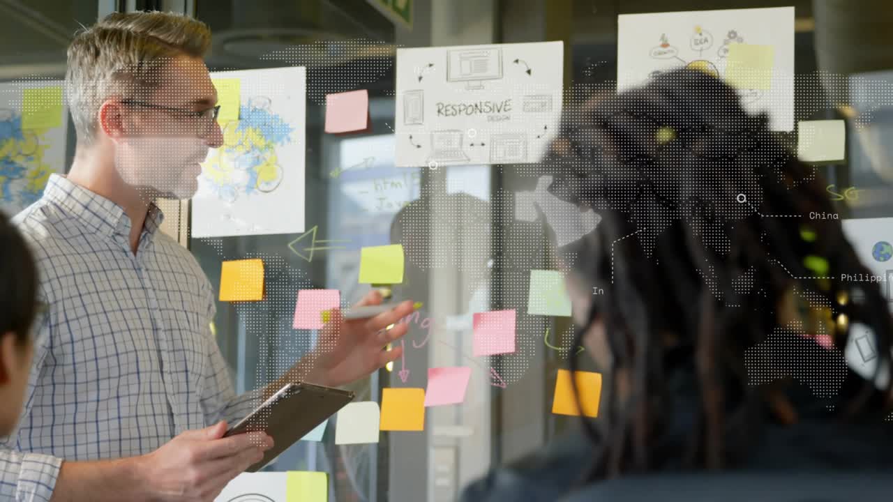 Man tapping Responsive label on transparent glass board linking notes for product design brainstorm