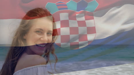 animación de la bandera de croacia sobre una mujer caucásica en la playa