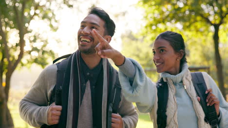 Hiking,-laugh-and-couple-in-a-forest-walking