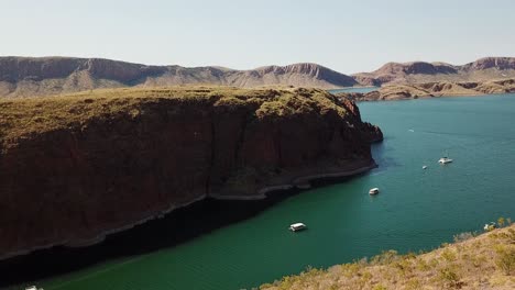 rising aerial view of lake argyle, a large freshwater reservoir in australia