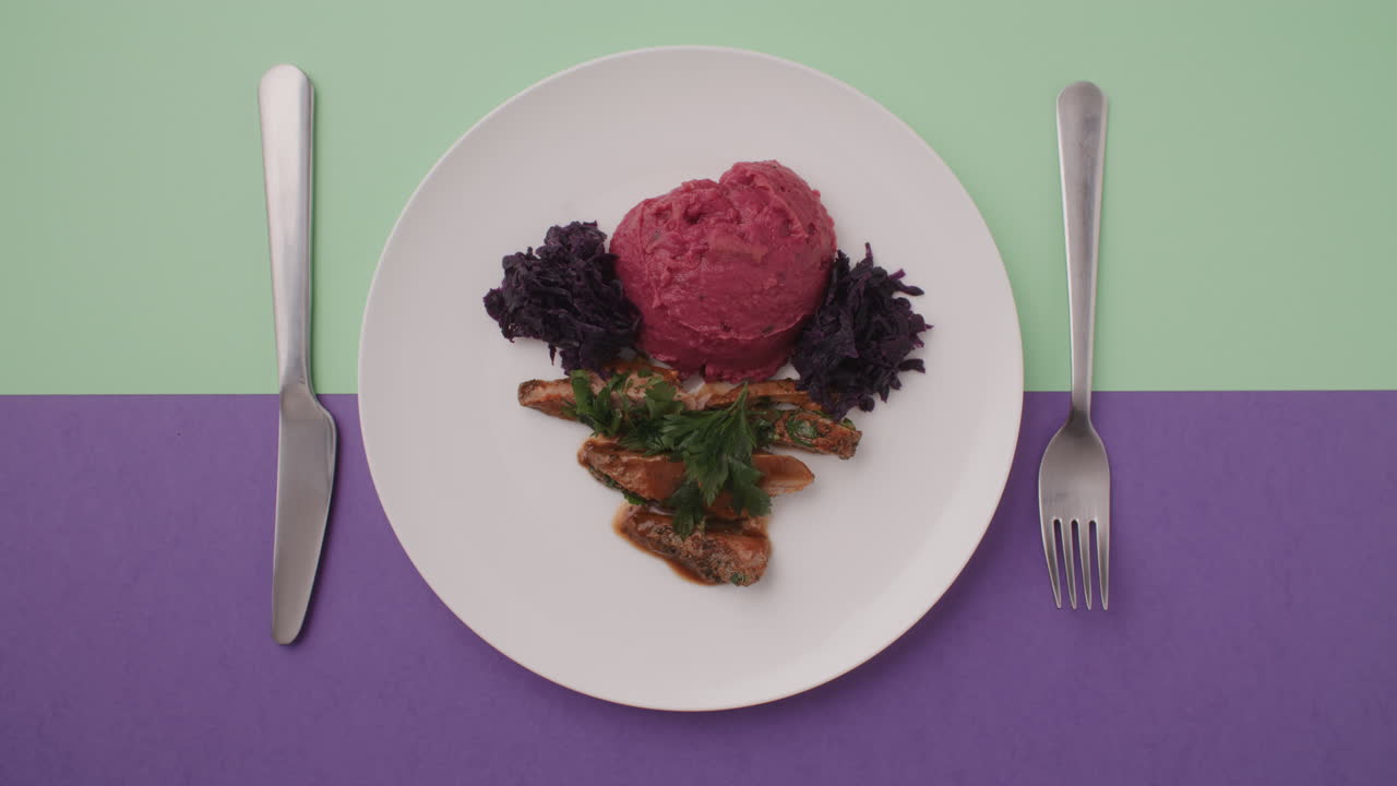 Plate of Mashed Potatoes, Red Cabbage, and Meat