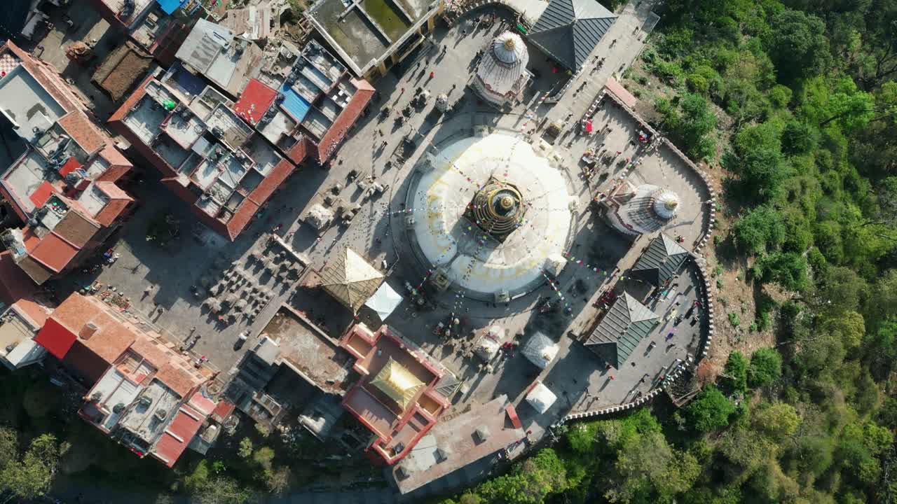 Aerial top view over Swayambhunath temple, ancient buddhist monastery, with prayer flags, Kathmandu, Nepal