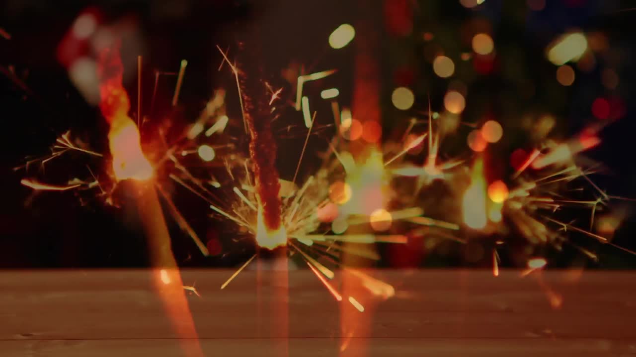 animación de chispas sobre el árbol de navidad y regalos