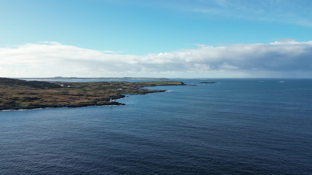 Aerial view, Connemara’s rugged Atlantic shoreline, showing rocky coastlines, sweeping inlet waters, and moorland landscapes under open sky in western Ireland