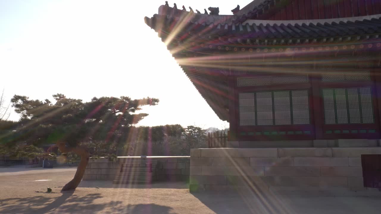 Historic Gyeongbokgung Palace With Rays Of Sun. Jongno District, Seoul, South Korea. tilt-down shot
