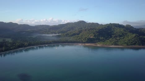 Aerial-pan-of-small-fishing-village-early-morning-in-the-Philippines