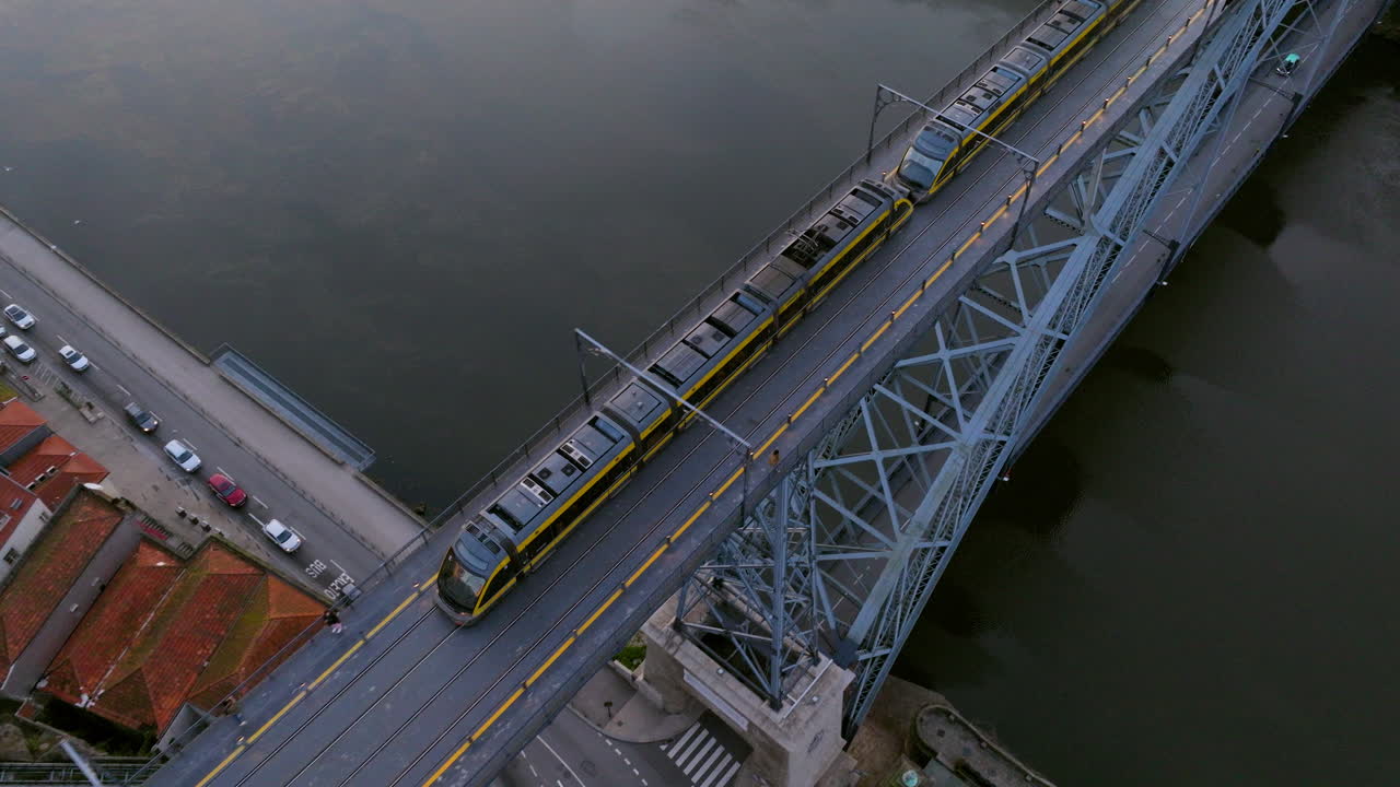 Misty sunrise rolling over city of Porto