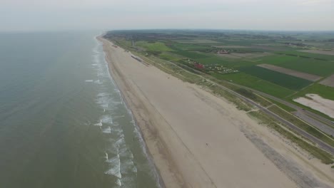 aerial: an overcast day at the sand beach between domburg and westkapelle, the netherlands