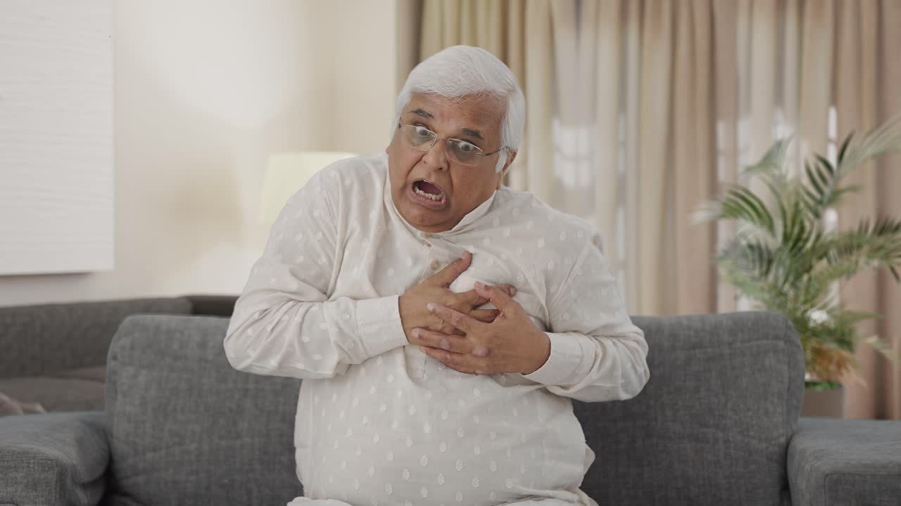 Sick Indian old man having a Heart attack