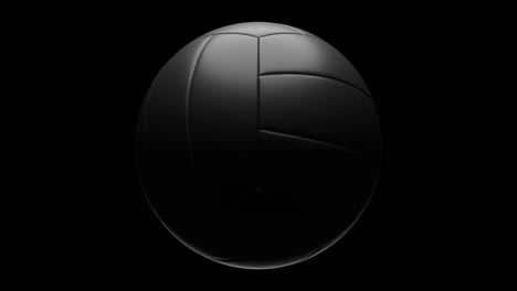 black volleyball ball isolated on black background.