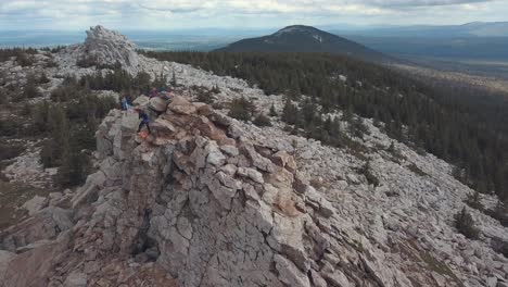 hikers on mountain summit