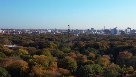 aerial view of the victory column in berlin's tiergarten park during autumn