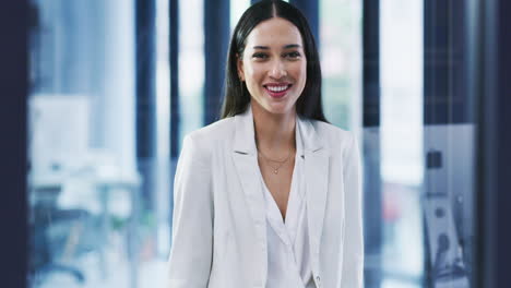 Portrait-of-a-happy-young-business-woman-laughing